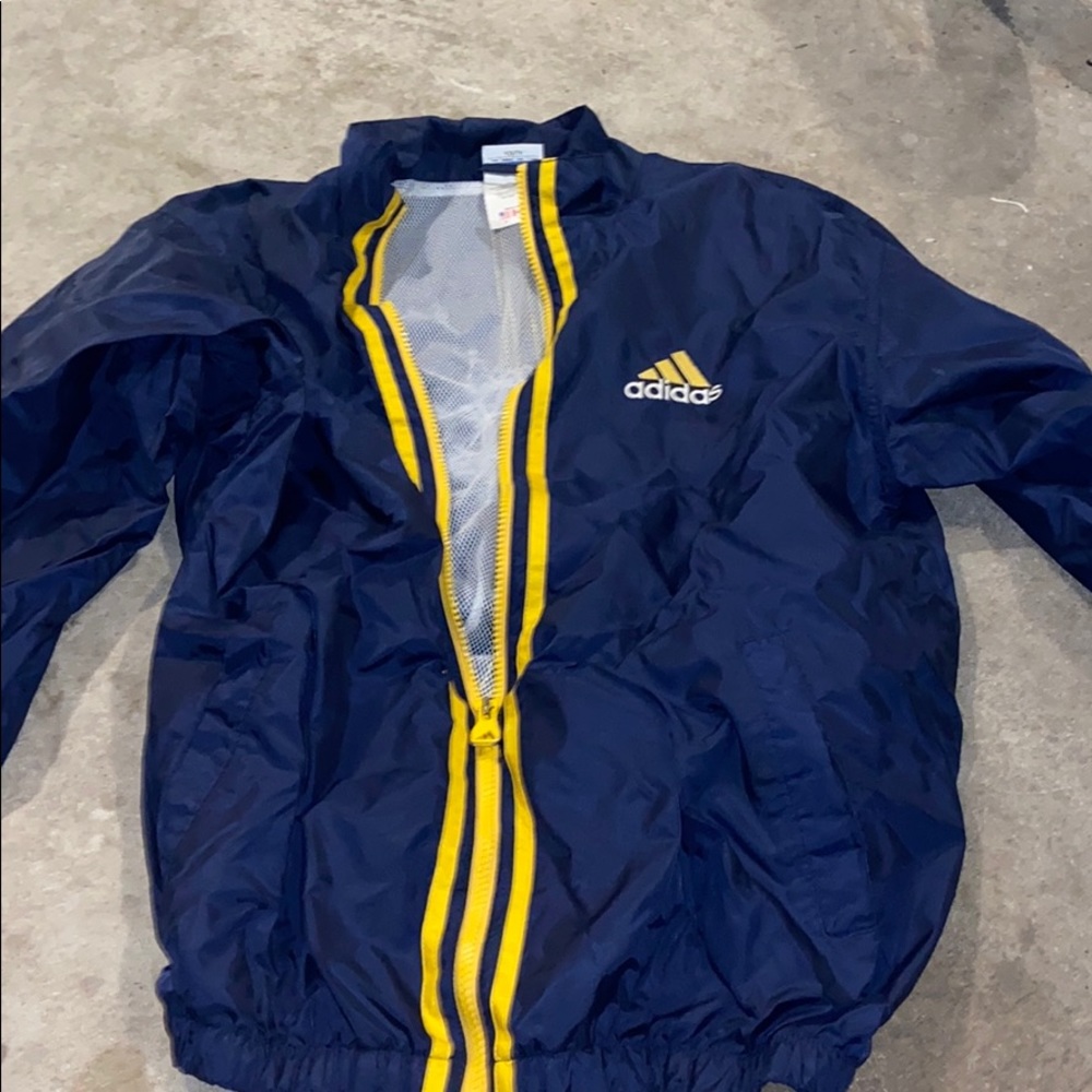 Navy blue and yellow windbreaker